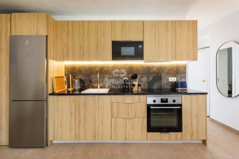 Renovated 1+1-bedroom ground-floor apartment with communal pool 